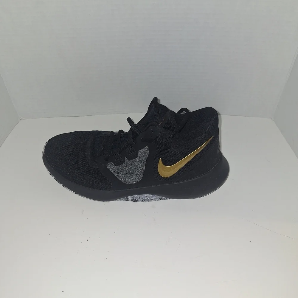 Nike Black and Gray Sneakers with Gold Swoosh